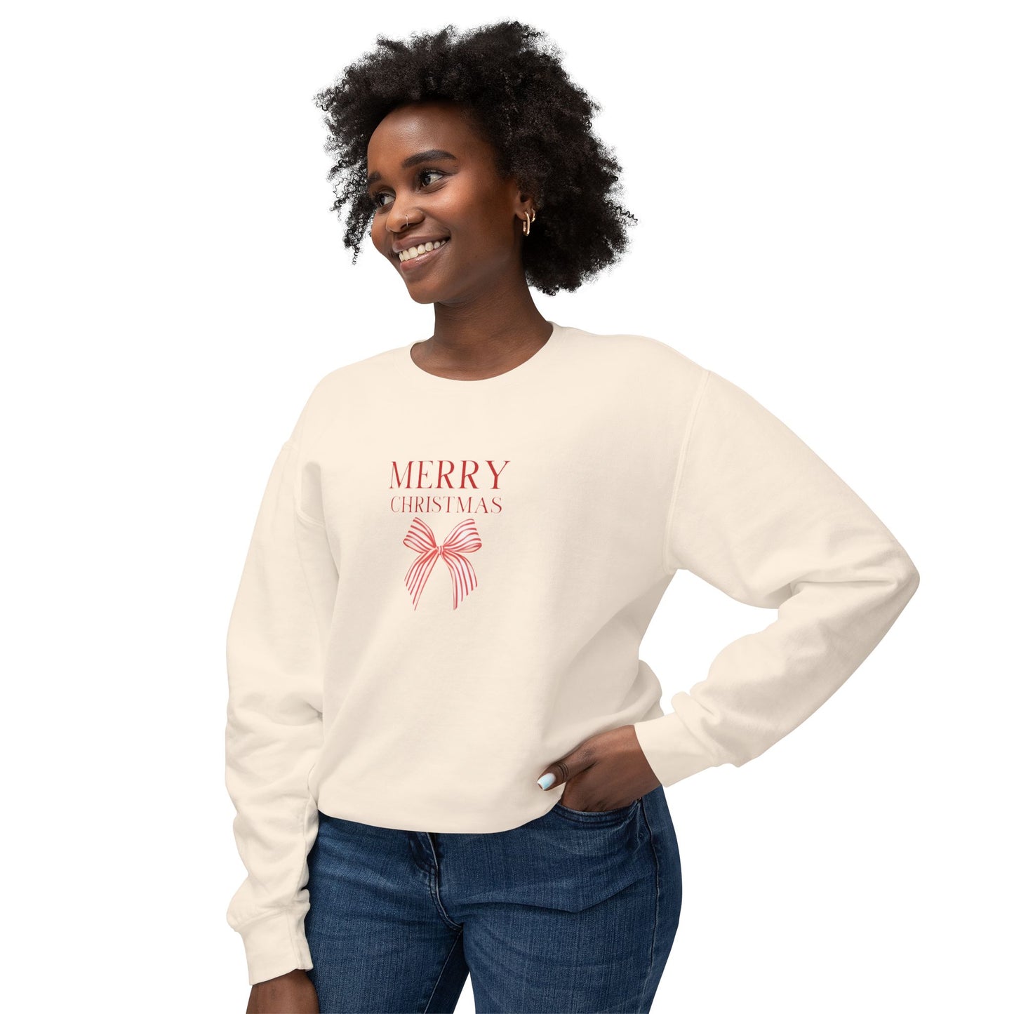 Woman wearing a cream sweatshirt with a cherry design on a white background