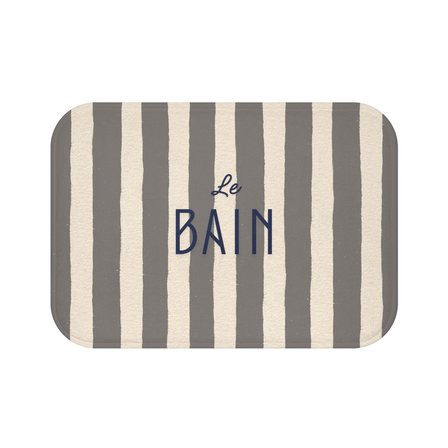 Striped bath mat with 'Le Bain' text on a white background