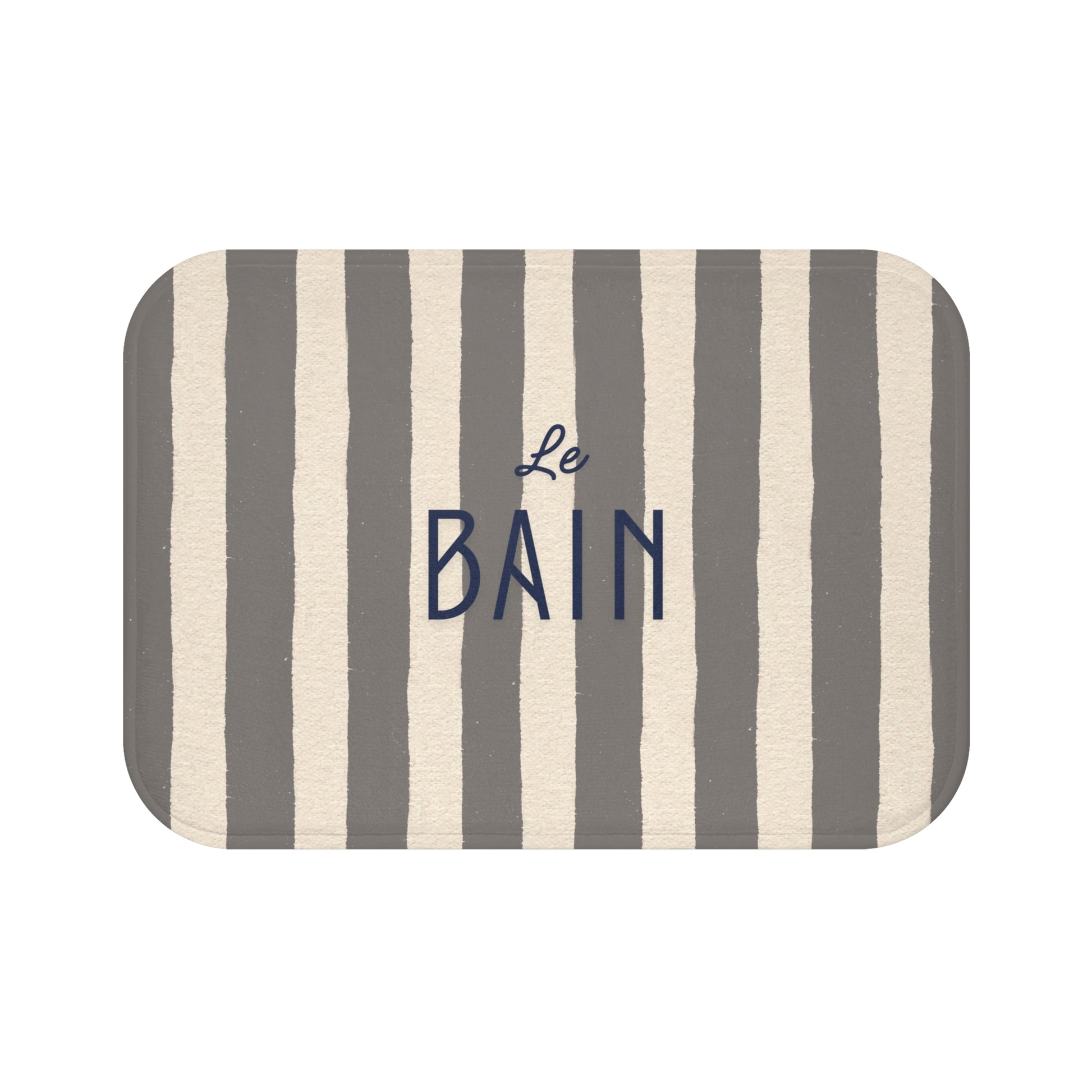 Striped bath mat with 'Le Bain' text on a white background