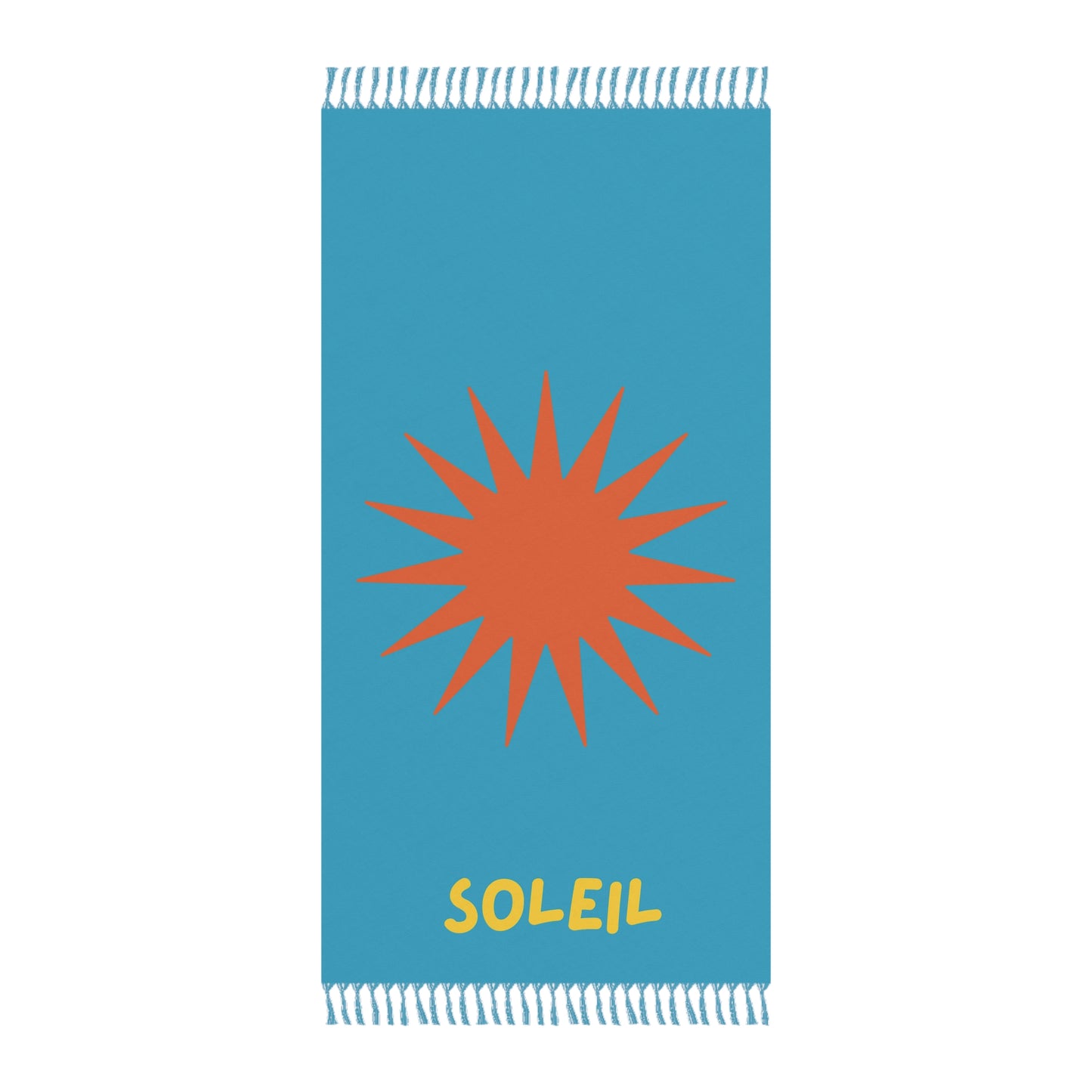 Blue towel with orange sun design and 'Soleil' text on a white background