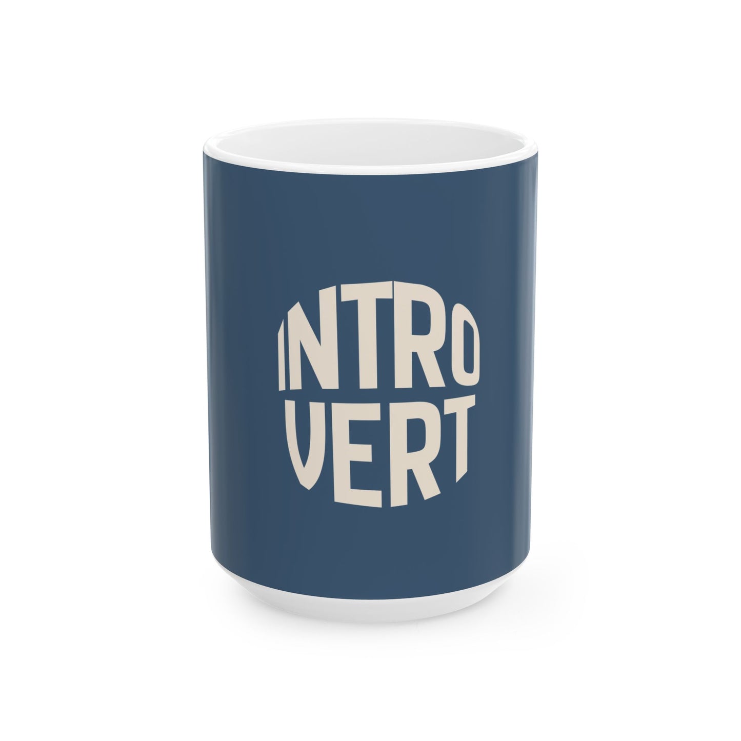 Navy mug with 'INTROVERT' in white text on a white background