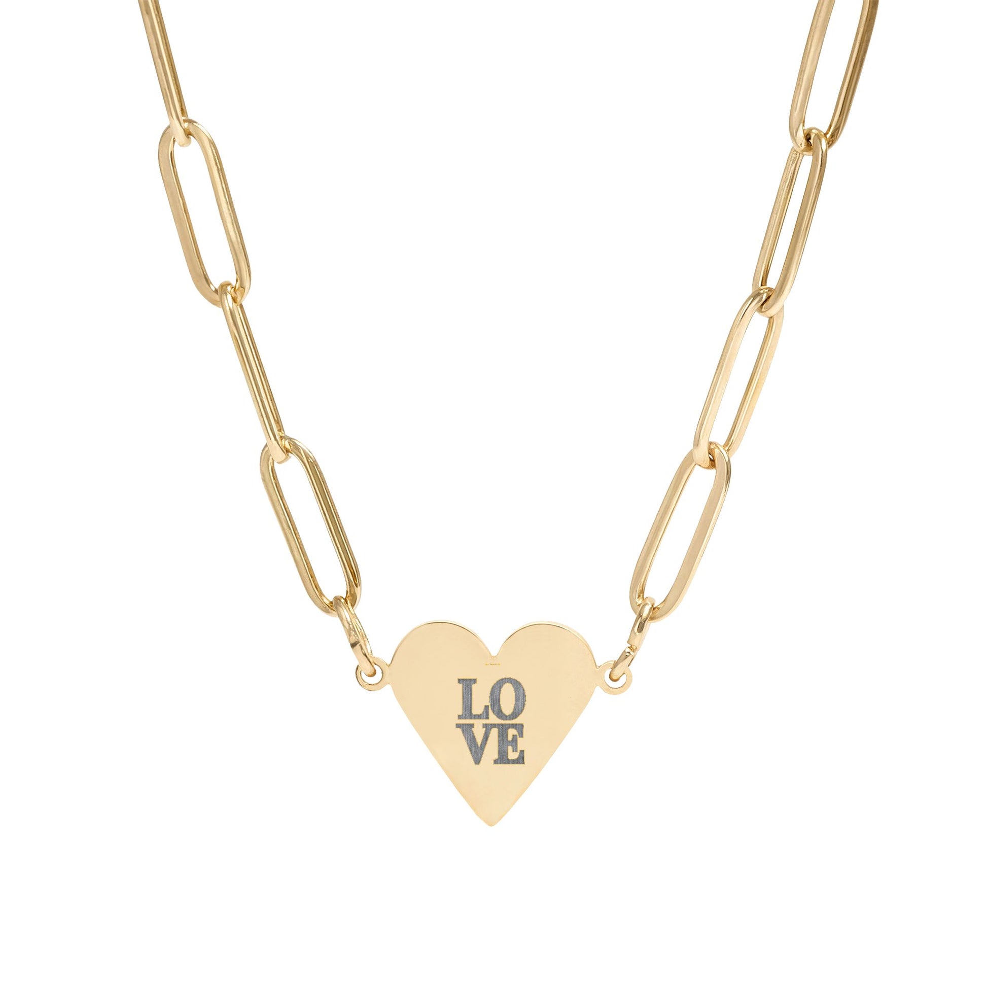 Gold necklace with a heart-shaped pendant displaying 'LOVE' on a white background