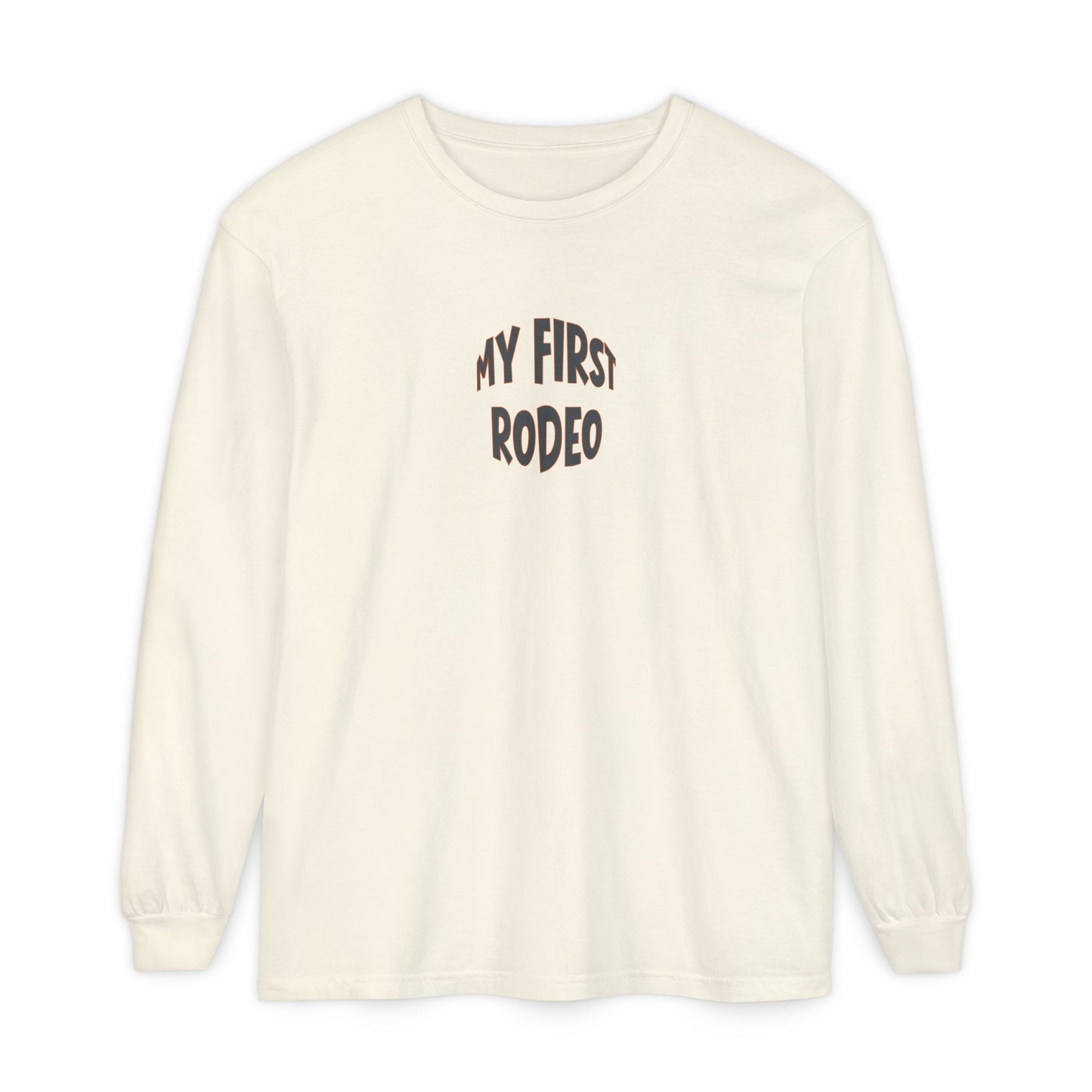 Beige long-sleeve shirt with 'My First Rodeo' text on a white background
