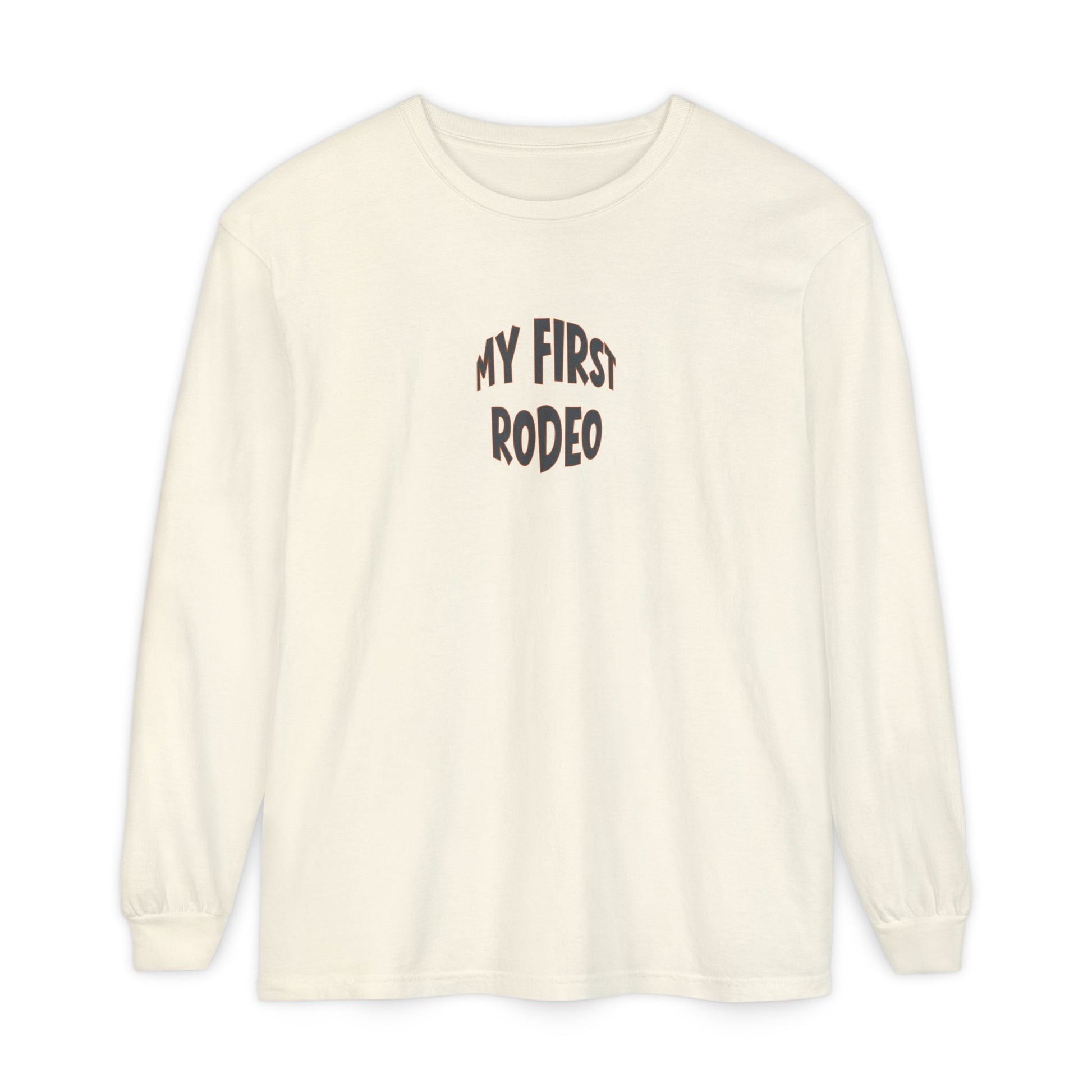 Beige long-sleeve shirt with 'My First Rodeo' text on a white background