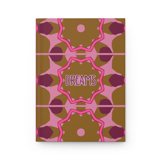 Notebook with geometric pattern and 'DREAMS' text on a white background