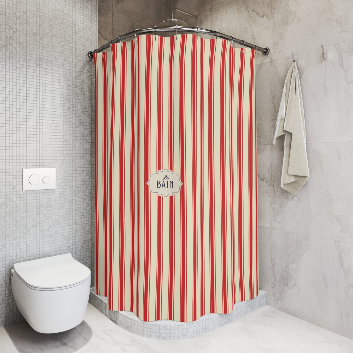 A striped shower curtain in red and cream vertical stripes hangs in a modern bathroom corner with a white toilet, gray tiled walls, and a folded towel.