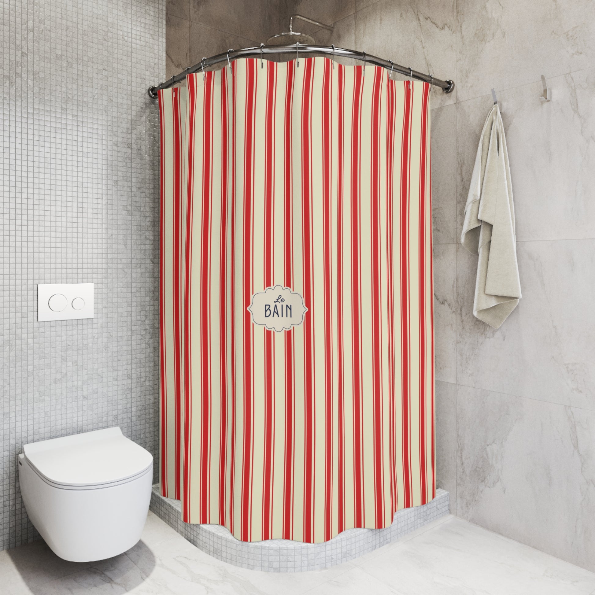 A striped shower curtain in red and cream vertical stripes hangs in a modern bathroom corner with a white toilet, gray tiled walls, and a folded towel.