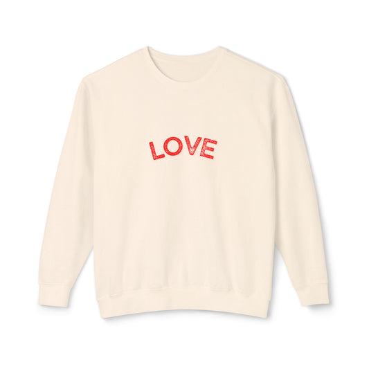 Beige sweater with 'LOVE' printed in red on a white background