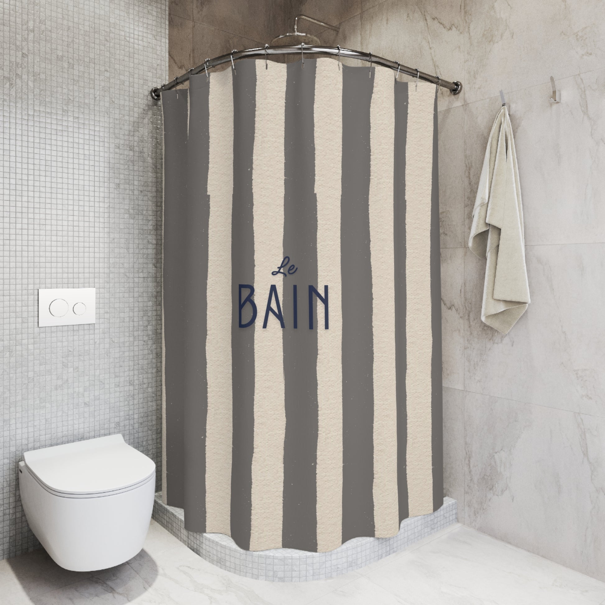 Striped shower curtain with 'Le Bain' text in a bathroom setting
