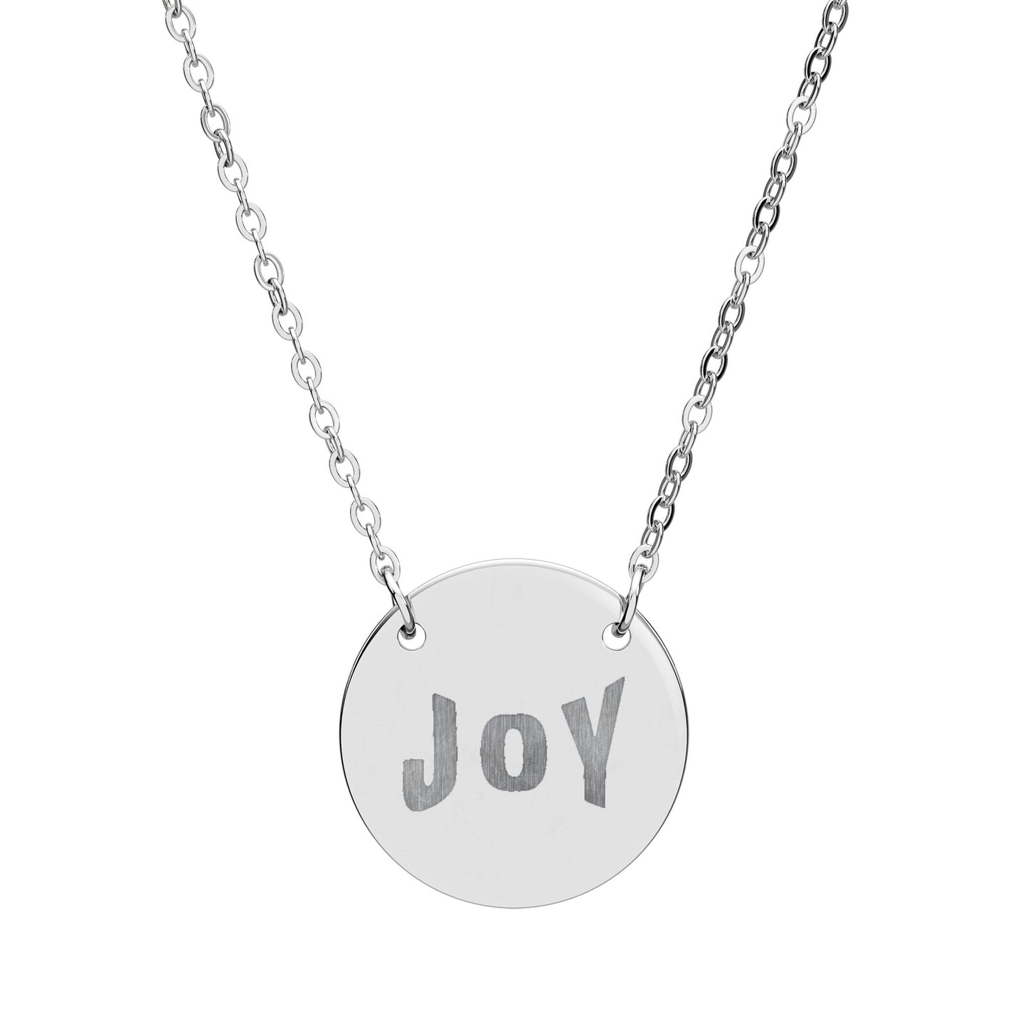 Silver necklace with a round pendant engraved with 'JOY' on a white background