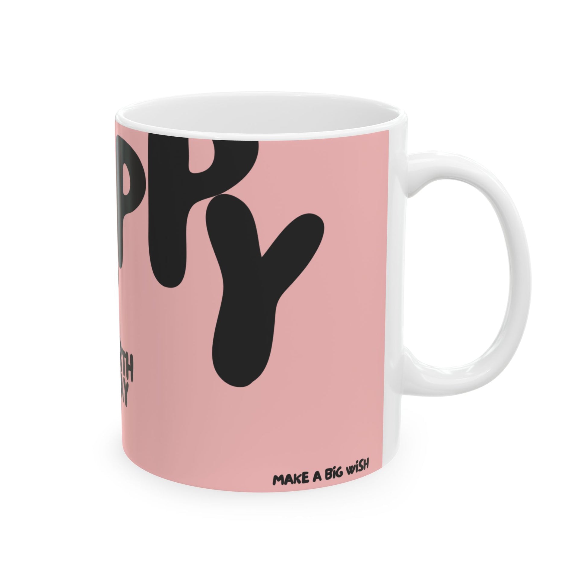 Pink mug with black text on a white background