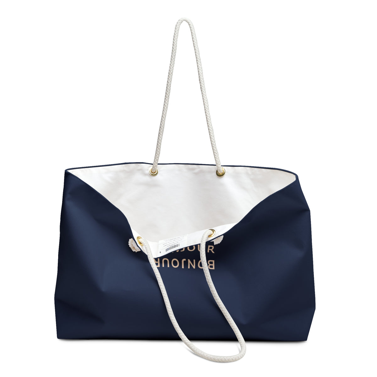 A navy blue tote bag with a white interior, featuring white rope handles and gold lettering that reads 'BONJOUR' on the front, set against a plain white background.