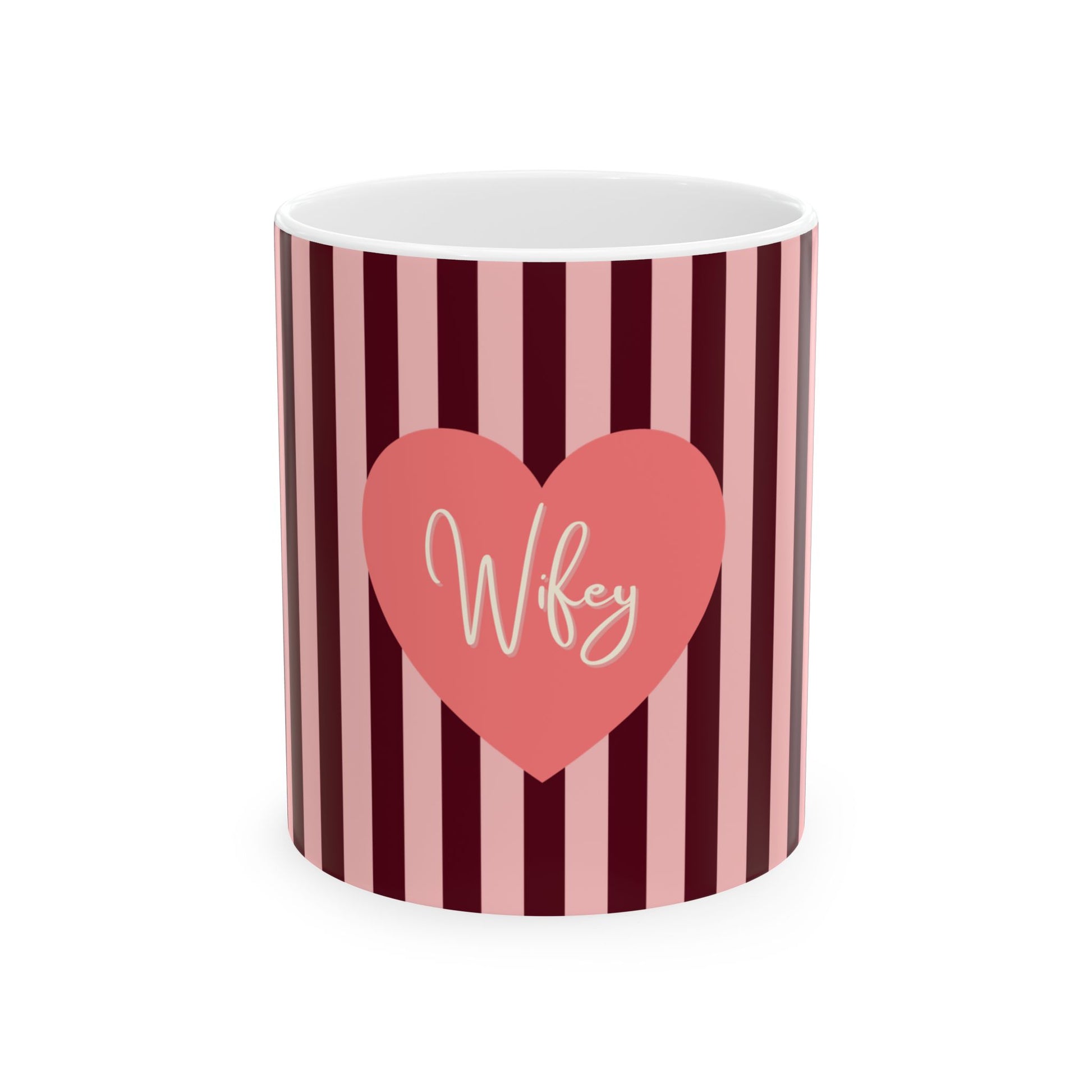 A white ceramic mug with vertical dark red and light pink stripes, featuring a pink heart graphic on the front with the word 'Wife' written in white script.