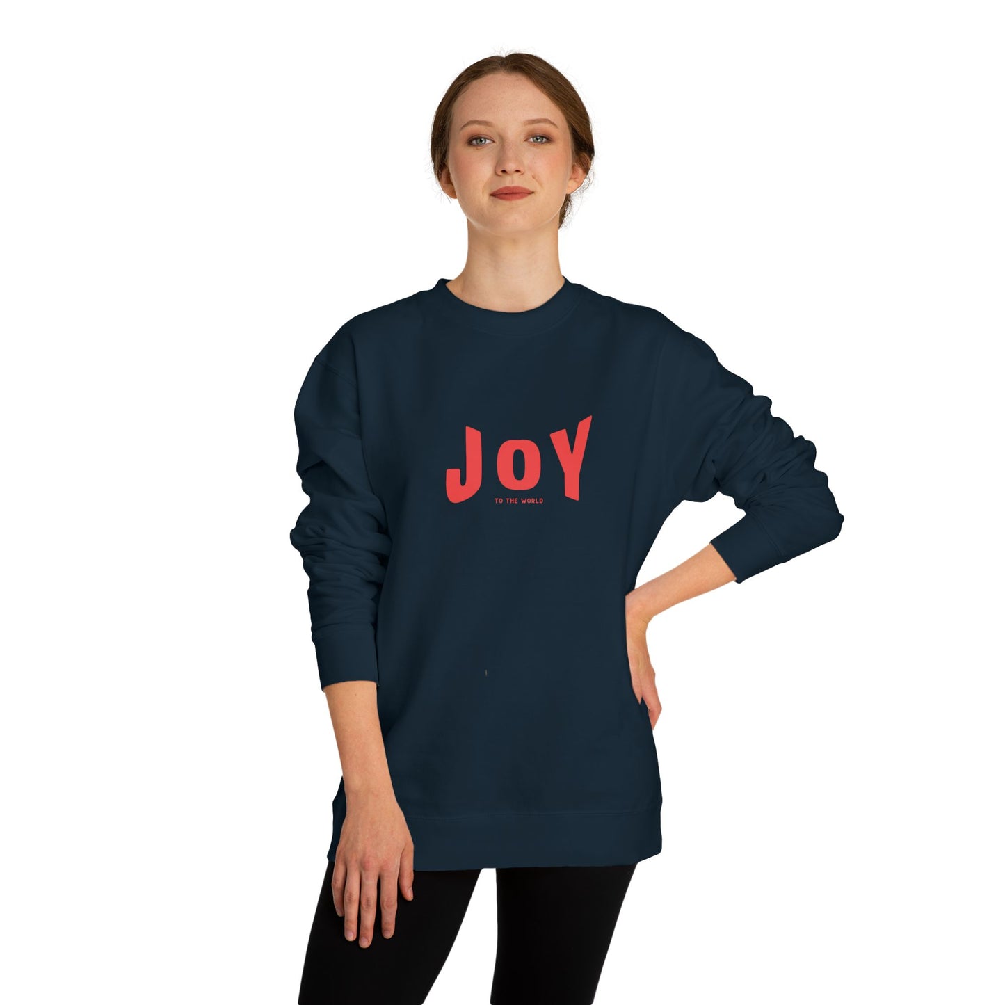 Person wearing a navy sweatshirt with 'JOY' printed in red on a white background