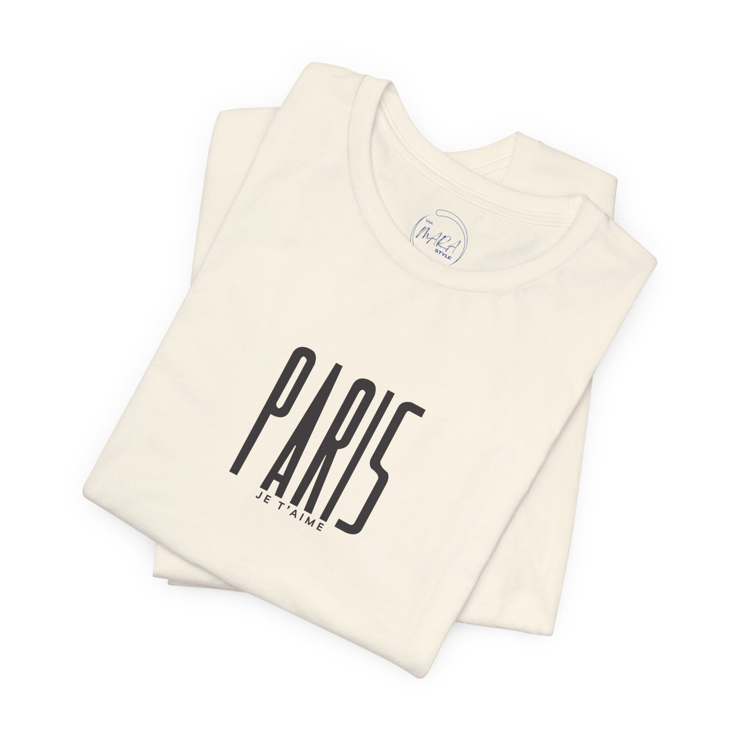 Folded cream-colored tank top with 'PARIS JE T'AIME' text on a white background