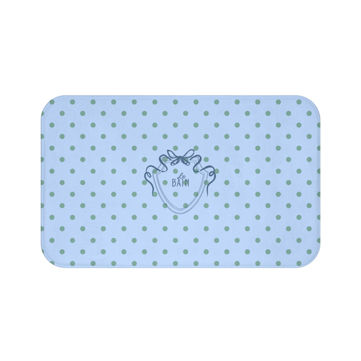Light blue bath mat with green polka dots and a logo on a white background