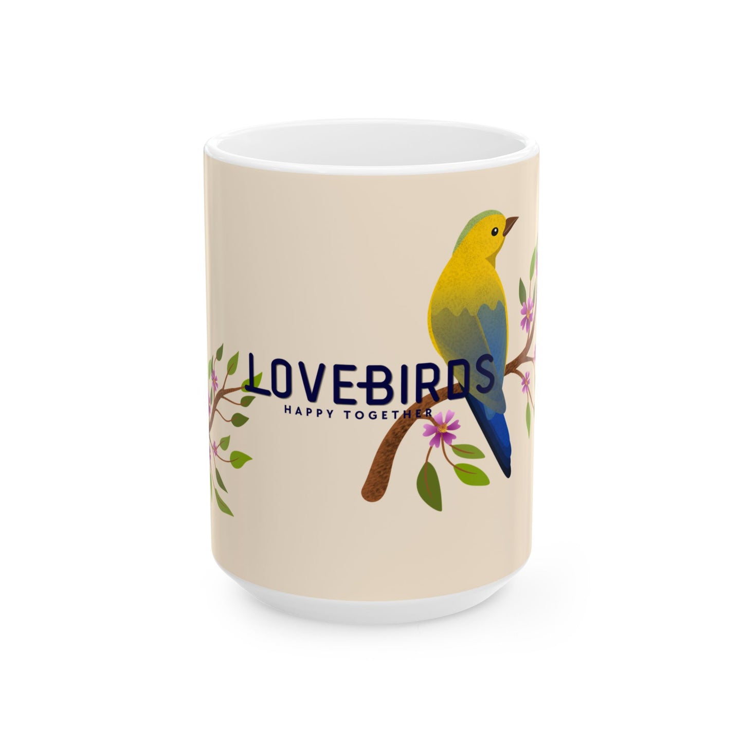 A white ceramic mug with a beige printed wrap design featuring a yellow and blue lovebird on a branch with pink flowers and the text 'LOVEBIRDS HAPPY TOGETHER'.