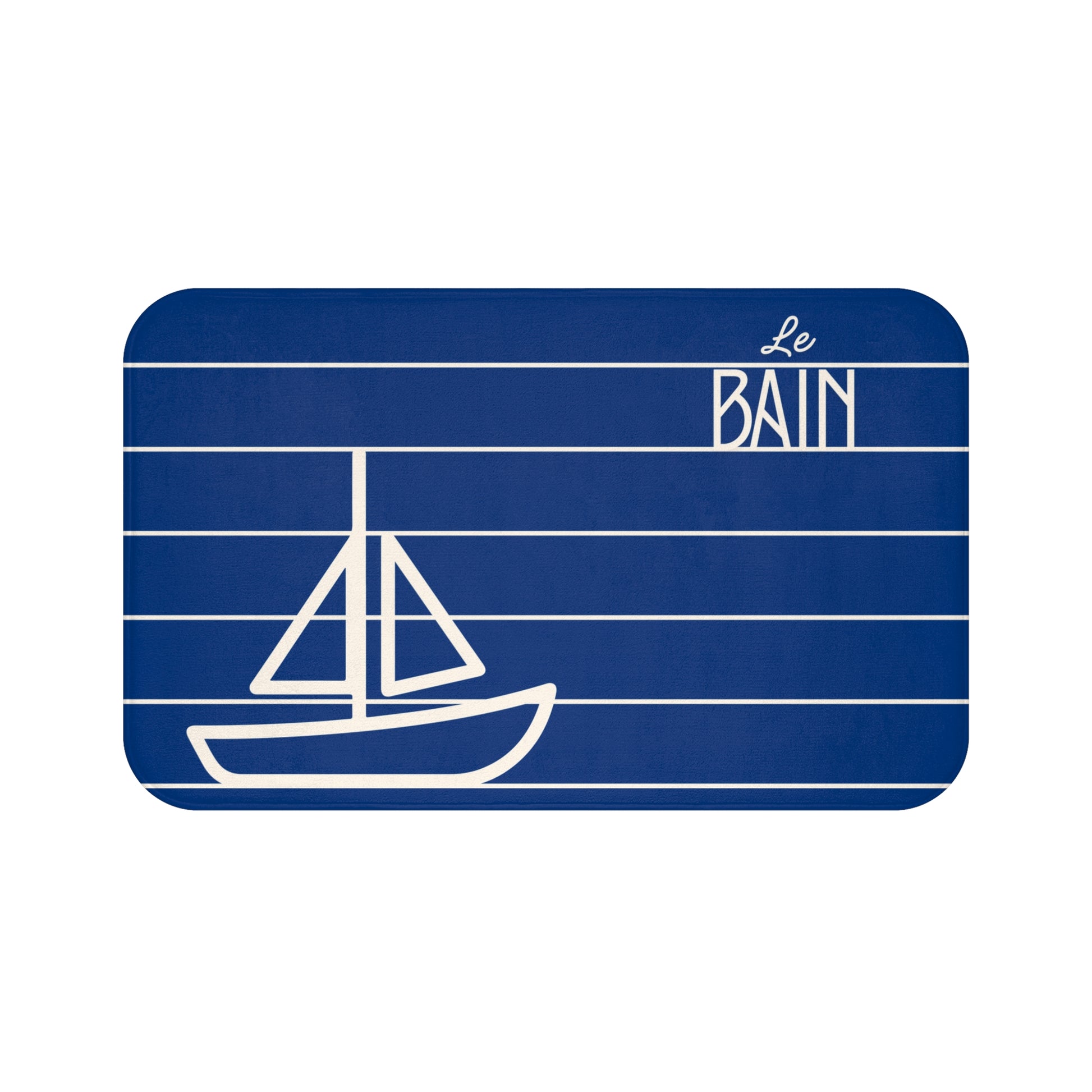 Blue bath mat with white sailboat design and 'Le Bain' text on a white background