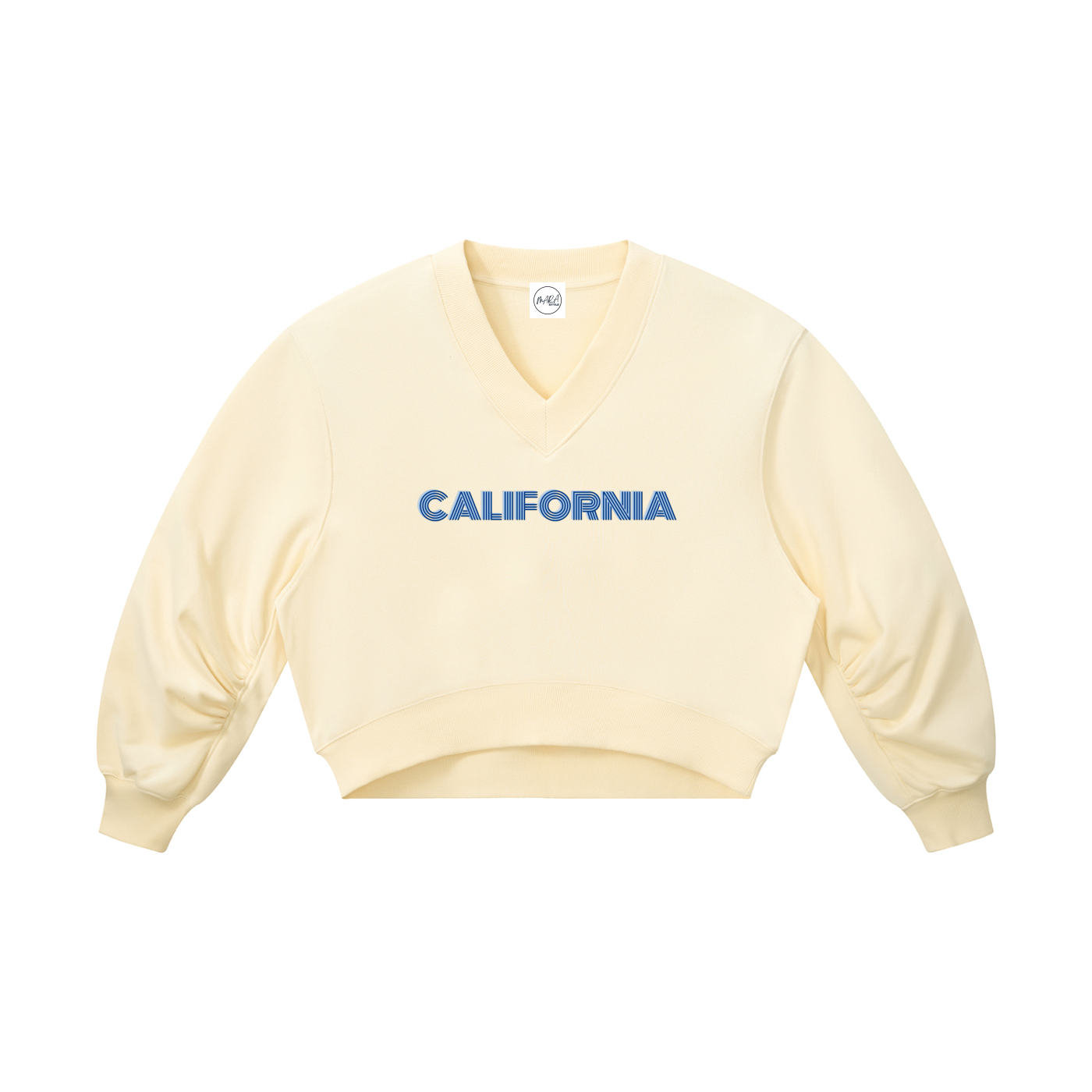 A pale cream-colored cropped V-neck sweatshirt with 'CALIFORNIA' printed in blue across the chest, displayed on a solid white background.